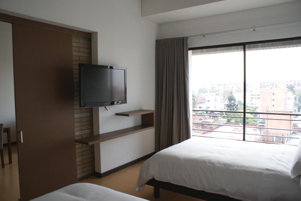 Viaggio Nueve Trez City Suites Bogotá Exterior foto