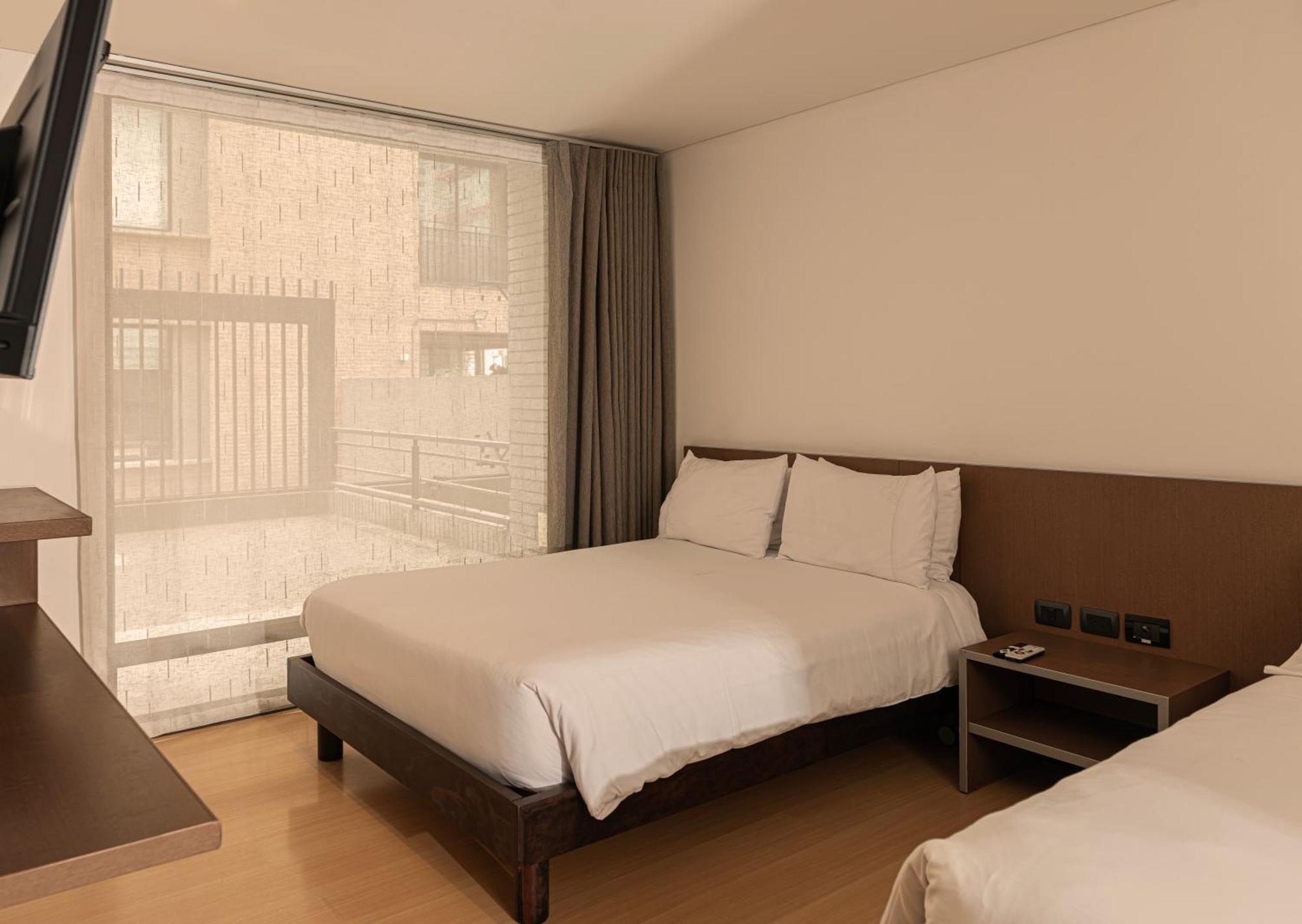 Viaggio Nueve Trez City Suites Bogotá Exterior foto