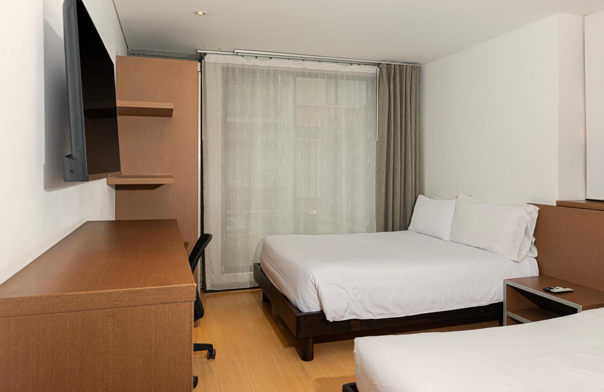 Viaggio Nueve Trez City Suites Bogotá Exterior foto